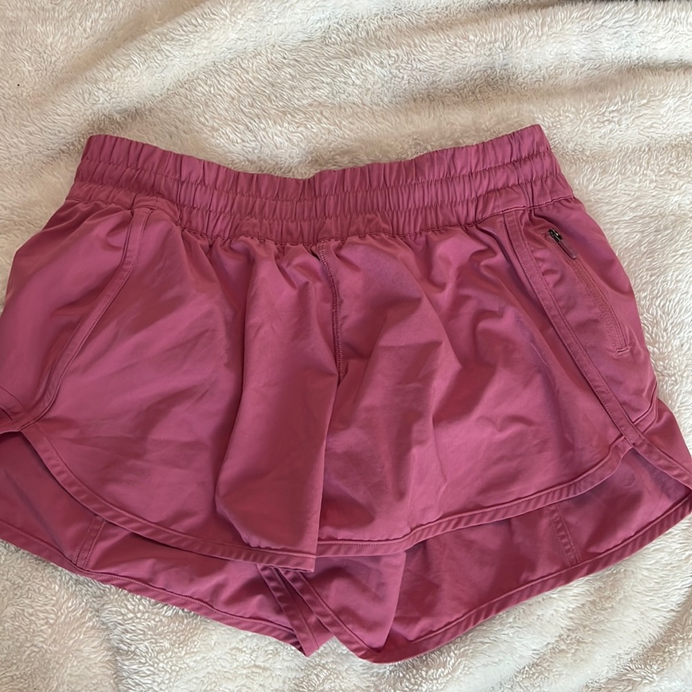 Pink Lululemon Mid Rise Tracker Shorts